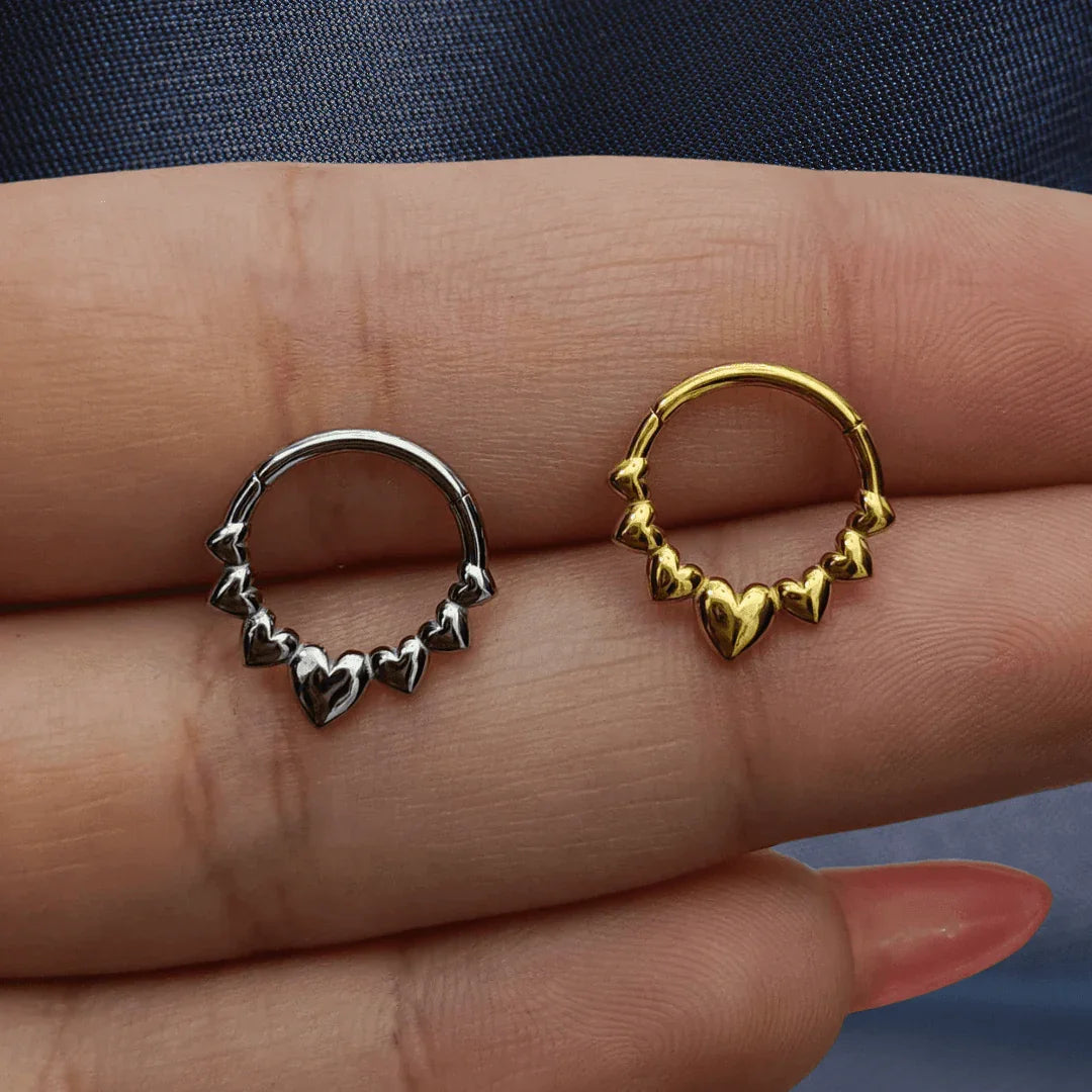 Anello a cliccker con design a cuori - GIOYAL PIERCING STORE