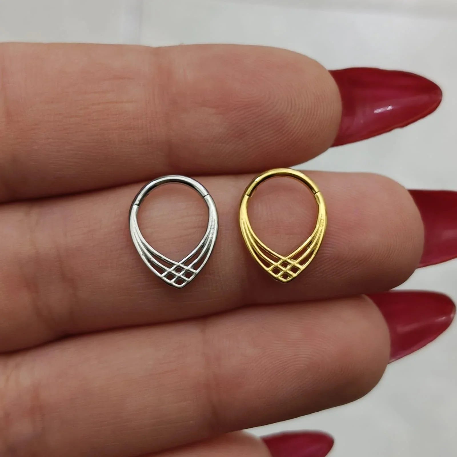 Anello a clicker con design intrecciato - GIOYAL PIERCING STORE