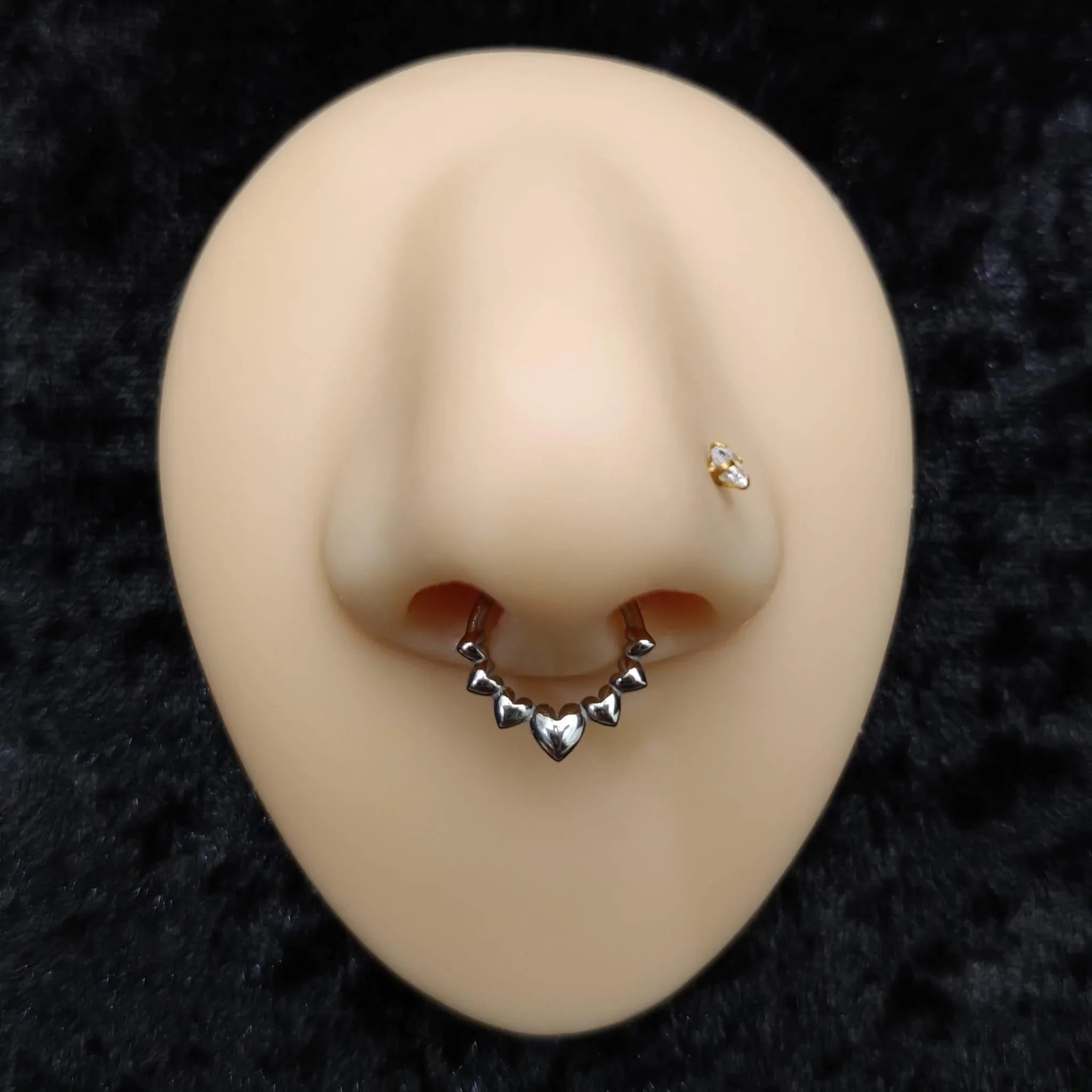 Anello a cliccker con design a cuori - GIOYAL PIERCING STORE